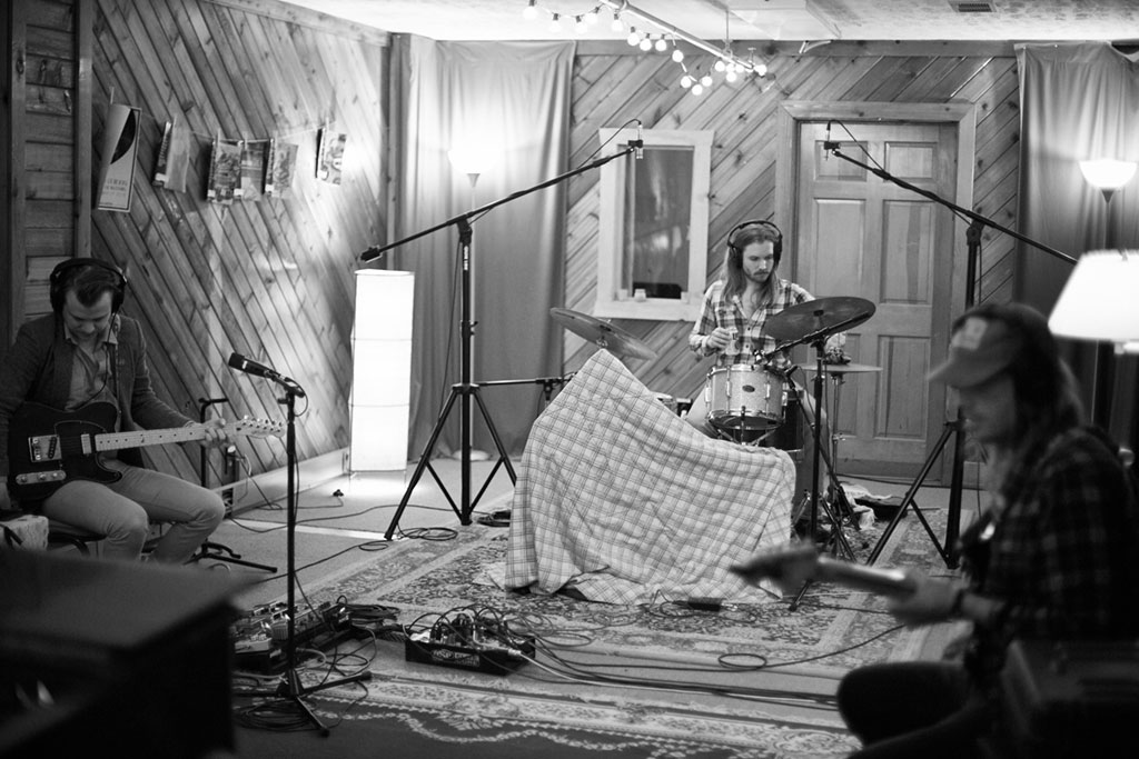 Musician plays in spacious recording studio in Nashville